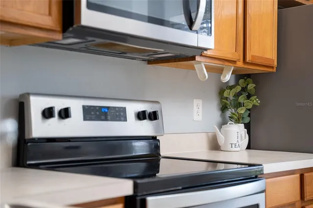 a view of kitchen with wooden floor