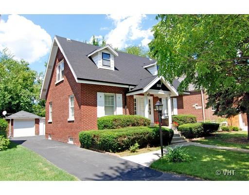 312 Blythe Road Riverside, IL 60546 - Photo 1 of 1 a front view of a house with a yard
