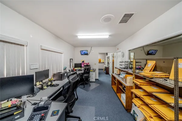 a room with gym equipment and a window