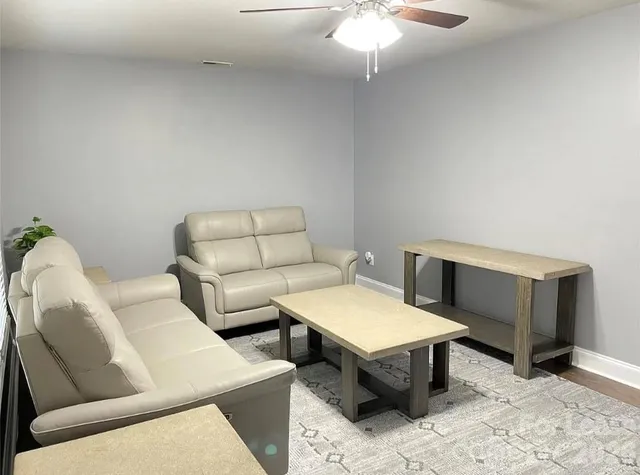 a living room with furniture and a couch