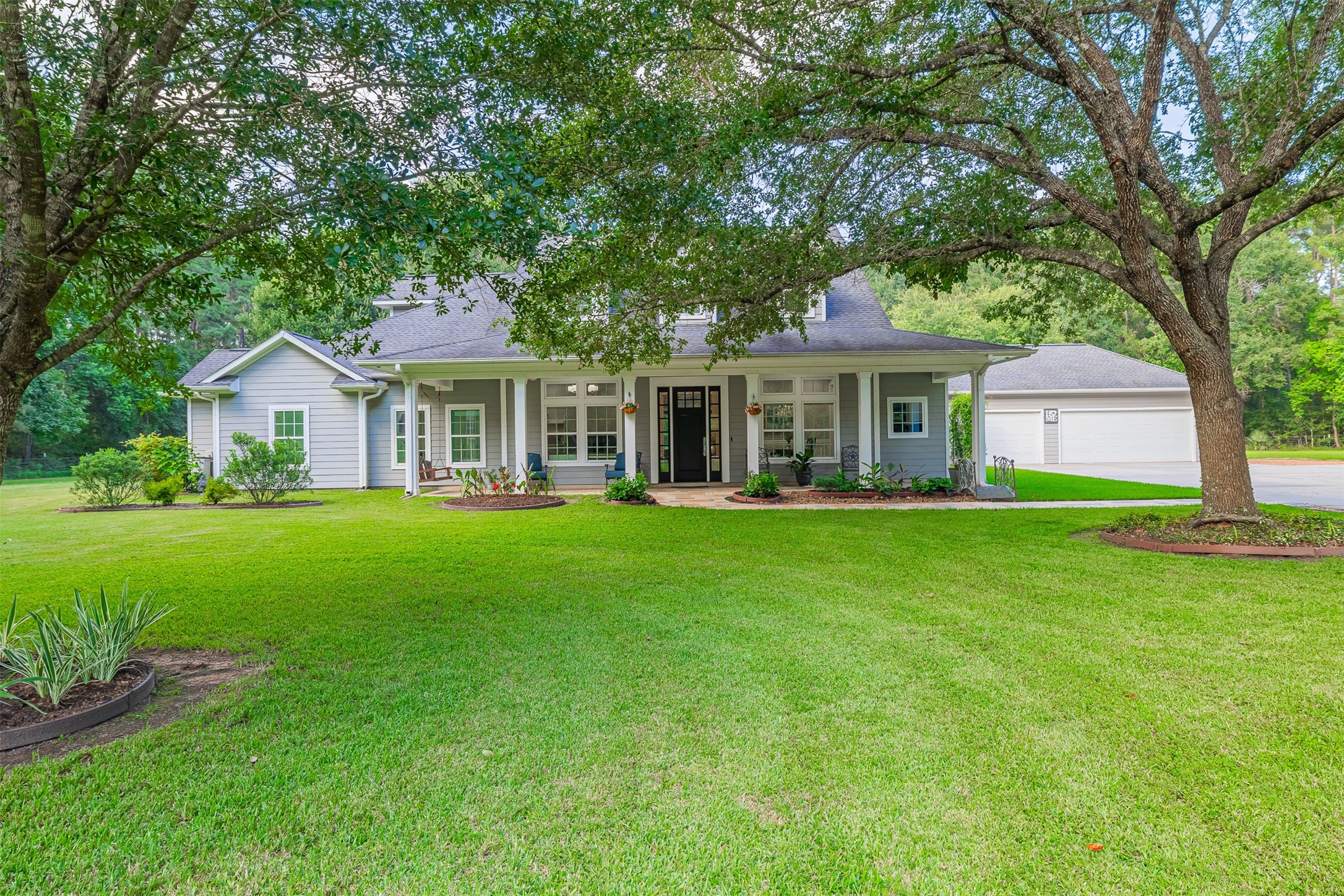 16636 Stonecrest Drive Conroe, TX 77302 - Photo 18 of 40 This is the first impression — the moment passersby slow their cars and wonder who’s lucky enough to live here. Nestled beneath a canopy of mature trees, the home radiates charm, grace, and quiet confidence. With its welcoming porch and storybook curb appeal, it doesn’t just catch your eye — it stirs something deeper: the feeling of home.