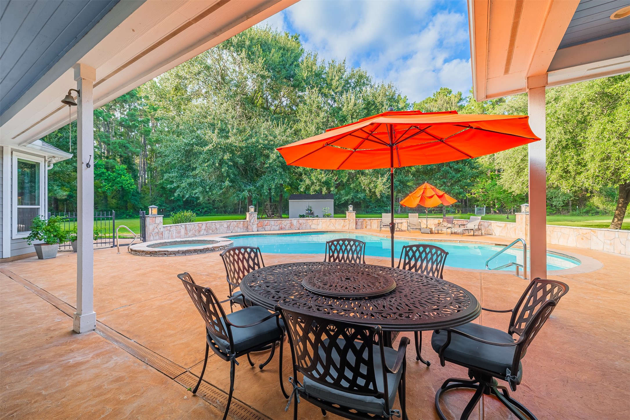 16636 Stonecrest Drive Conroe, TX 77302 - Photo 20 of 40 Feel the breeze stir under the umbrella as you sip a cold drink and chat with friends between dips in the pool. The grill is sizzling, kids are giggling, and time slows down just enough to breathe, laugh, and let joy linger a little longer.