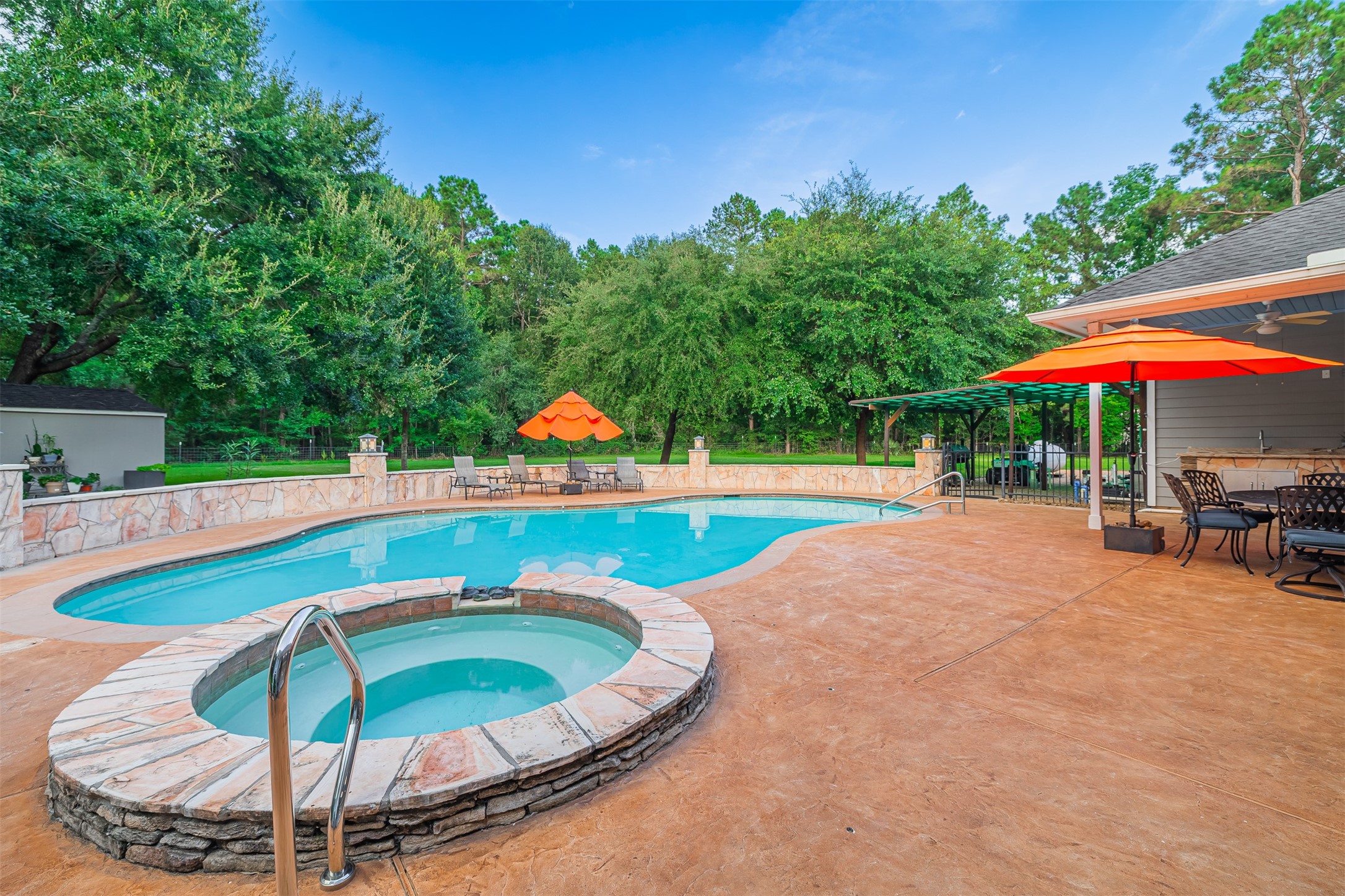 16636 Stonecrest Drive Conroe, TX 77302 - Photo 5 of 40 Picture yourself in the bubbling spa under a canopy of stars, your favorite playlist humming in the background. The day ends with shoulders relaxed, heart full, and the promise of another poolside moment tomorrow. And when the seasons shift, a custom winter cover keeps everything protected and ready for your return.