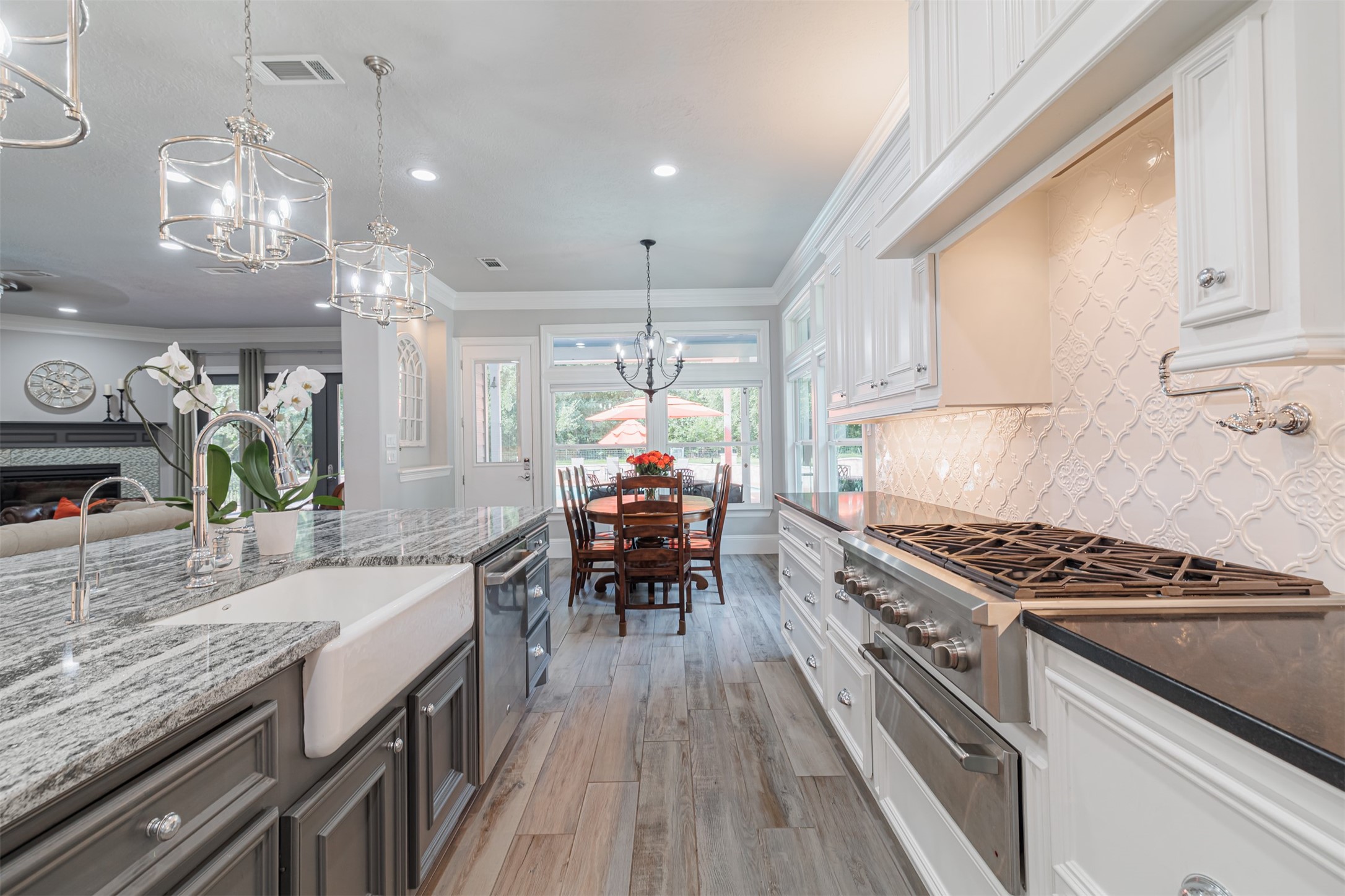 16636 Stonecrest Drive Conroe, TX 77302 - Photo 10 of 40 From the satisfying click of the gas burners to the view out the window as dinner simmers—this space wraps you in comfort and quiet joy, meal after meal.