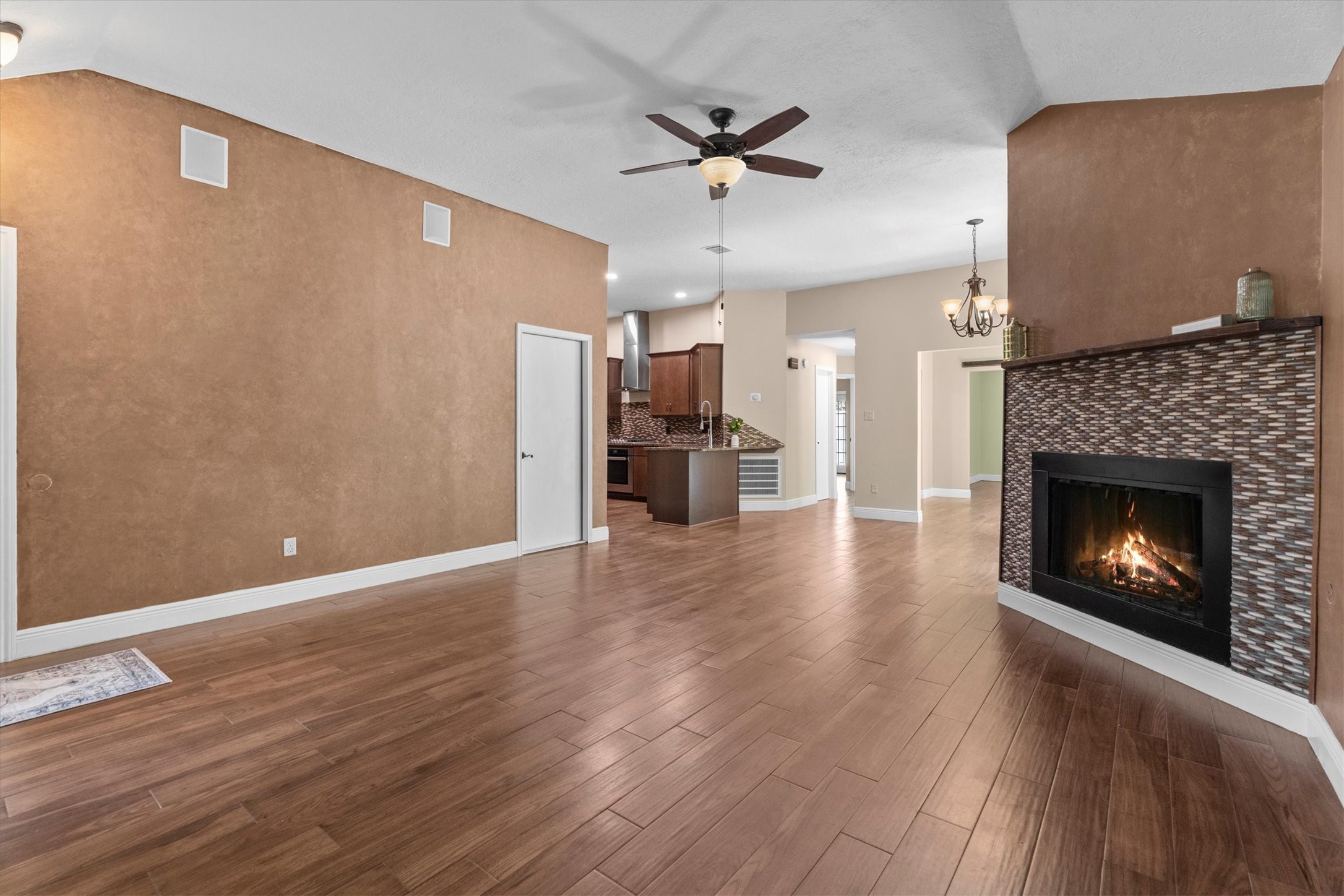5010 Deer Point Drive Spring, TX 77389 - Photo 2 of 32 Wood plank TILE flooring throughout and an updated fireplace
