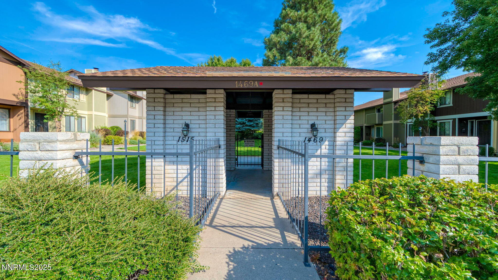 1515 Foster Drive Reno, NV 89509 - Photo 13 of 50 a front view of a house with garden