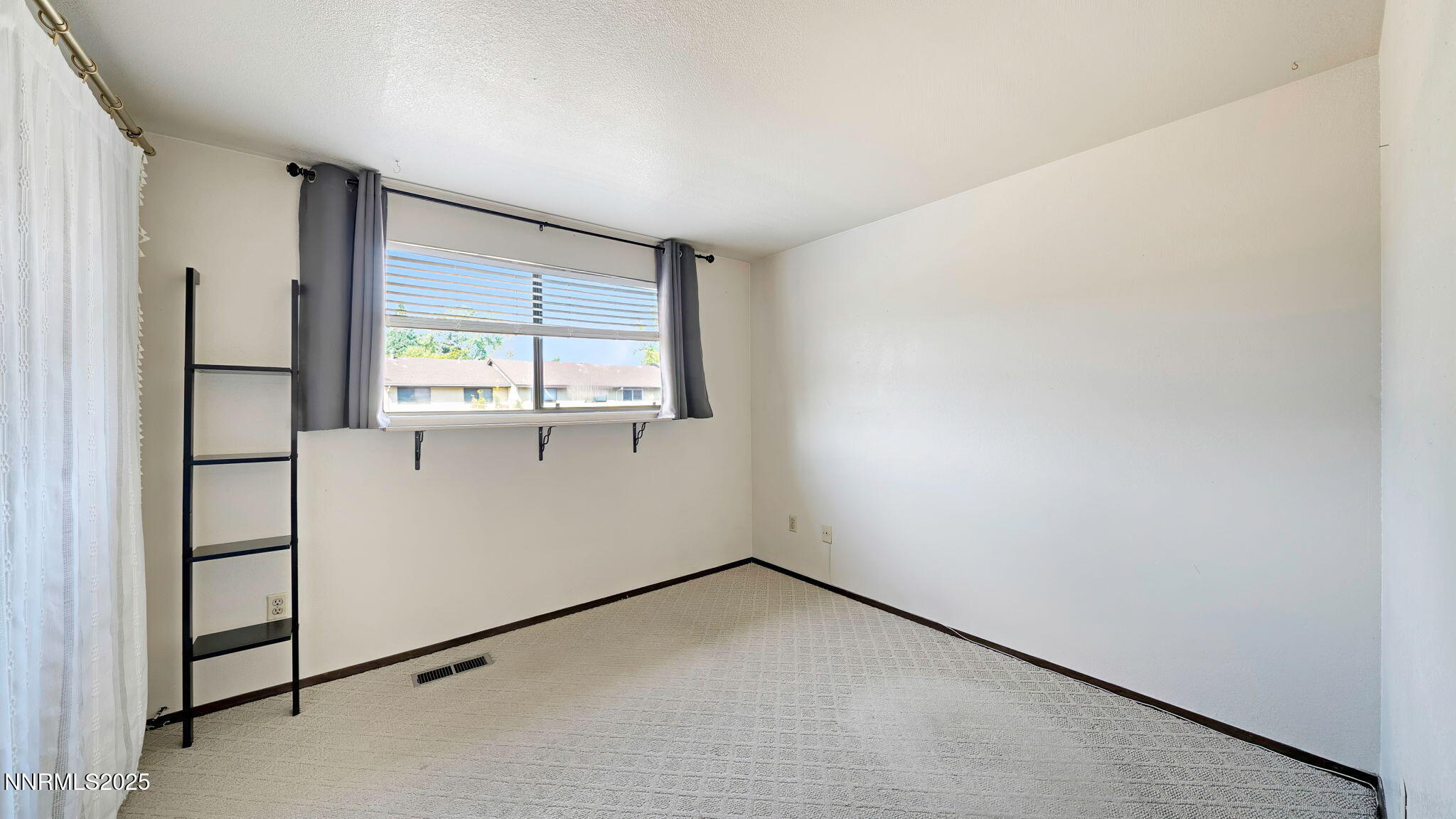 1515 Foster Drive Reno, NV 89509 - Photo 50 of 50 an empty room with windows
