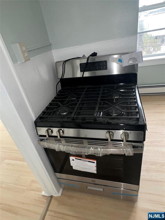 193 President Street, Unit 9 Passaic, NJ 07055 - Photo 10 of 11 a close up of a stove top oven