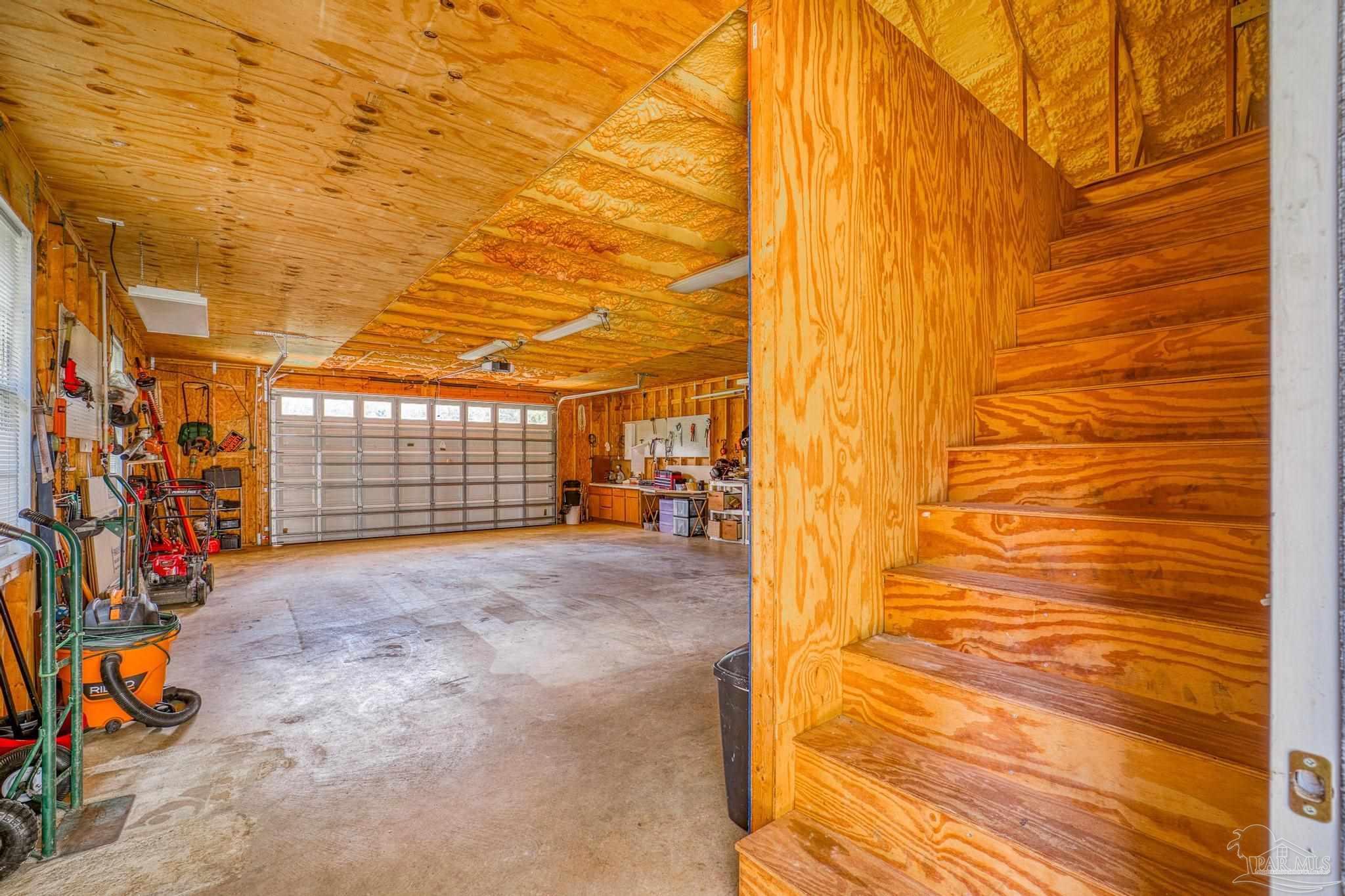 5897 Curtis Road Pace, FL 32571 - Photo 37 of 45 stairs to loft space - w/ spray foam insulation