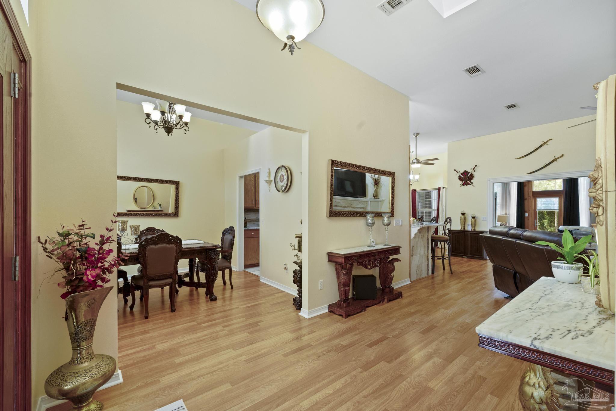 5897 Curtis Road Pace, FL 32571 - Photo 5 of 45 looking from front door into Dr to L, bonus to R