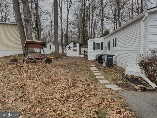 a house view with a backyard space