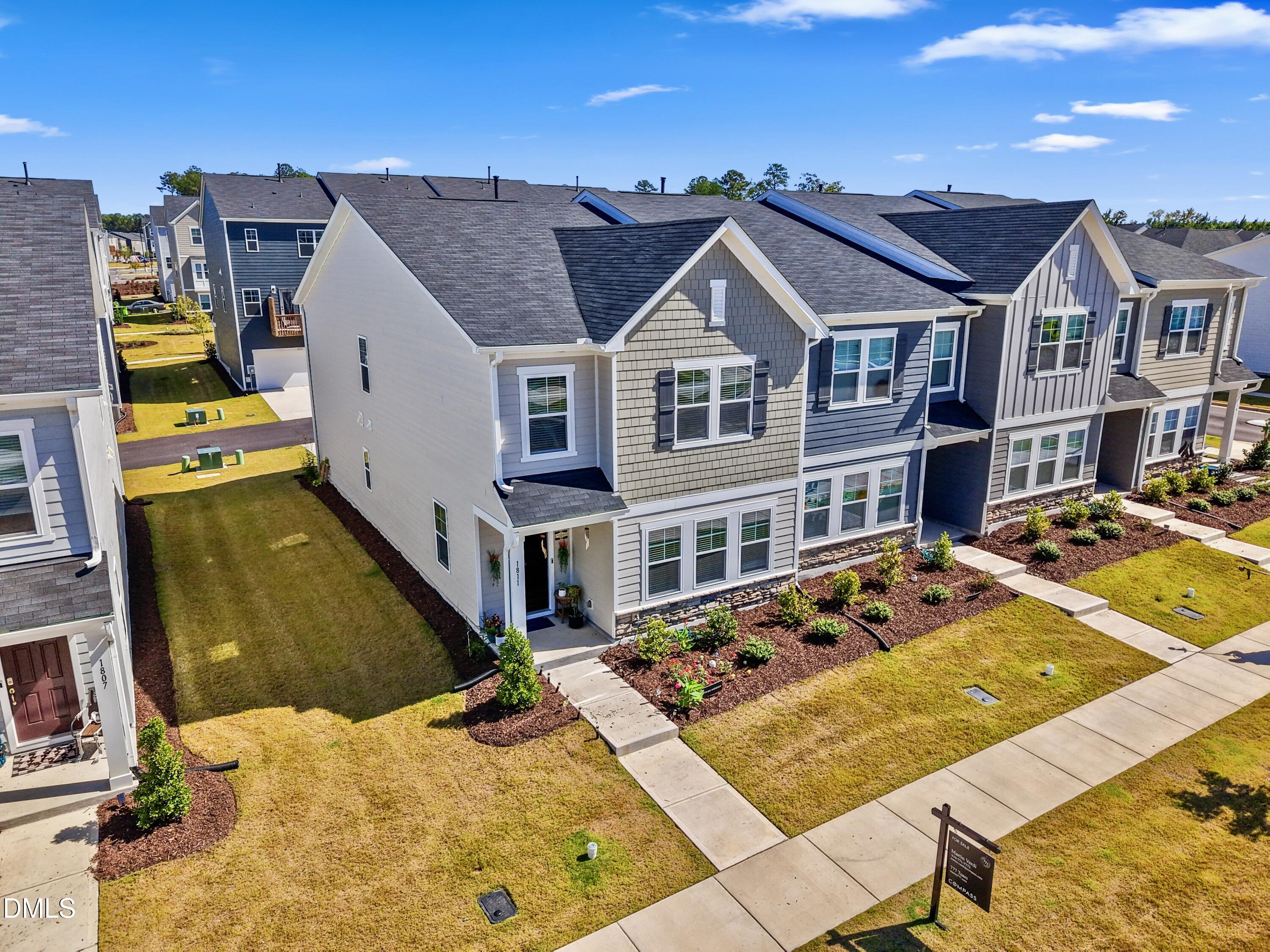 1811 Aspen River Lane Apex, NC 27502 - Photo 2 of 53 a view of a city with tall buildings