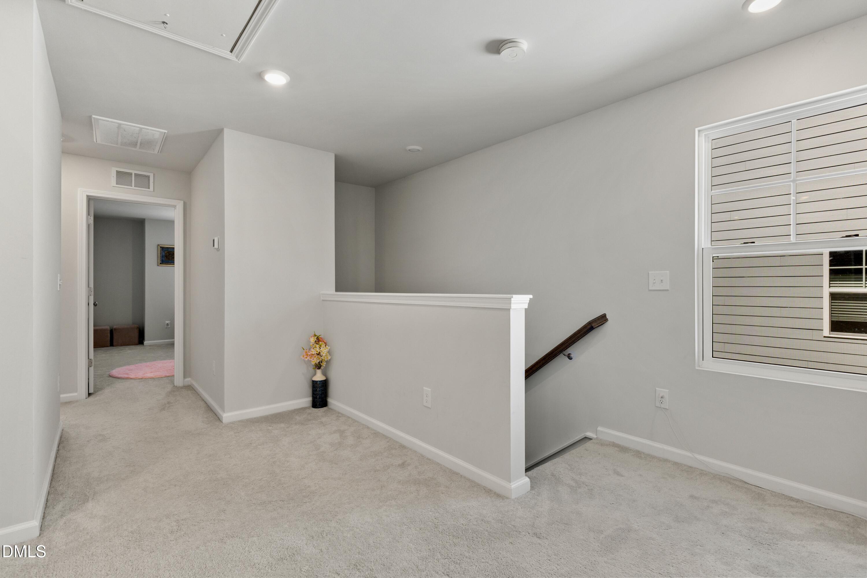 1811 Aspen River Lane Apex, NC 27502 - Photo 21 of 53 a view of an empty room