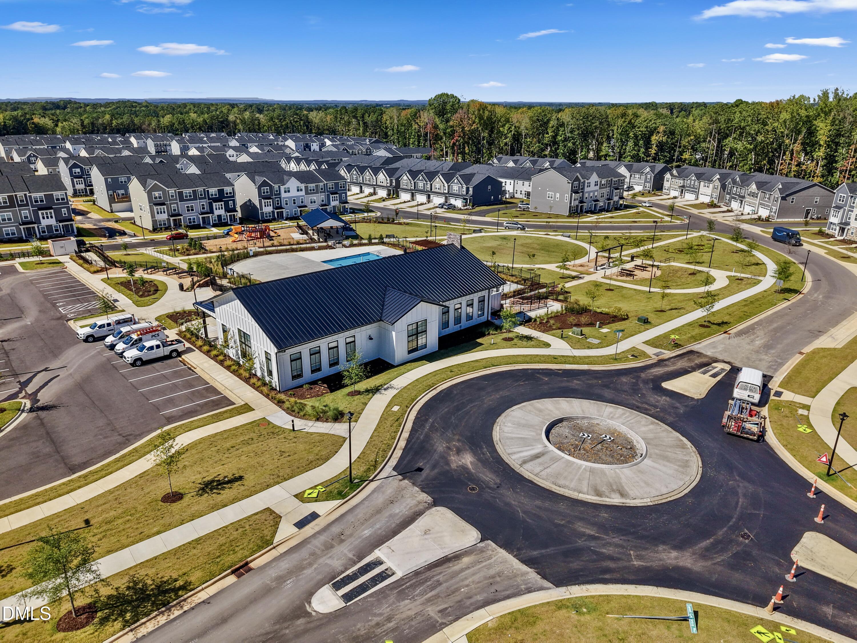 1811 Aspen River Lane Apex, NC 27502 - Photo 34 of 53 a view of a swimming pool with outdoor seating