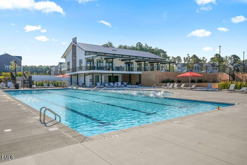 1811 Aspen River Lane Apex, NC 27502 - Photo 37 of 53 a view of a house with a yard
