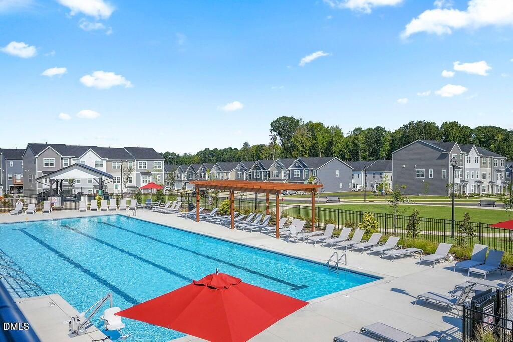 1811 Aspen River Lane Apex, NC 27502 - Photo 38 of 53 a view of a city from a balcony