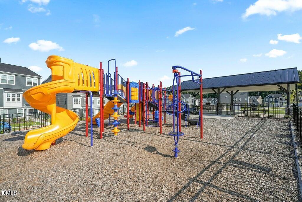 1811 Aspen River Lane Apex, NC 27502 - Photo 40 of 53 a view of a park with slide