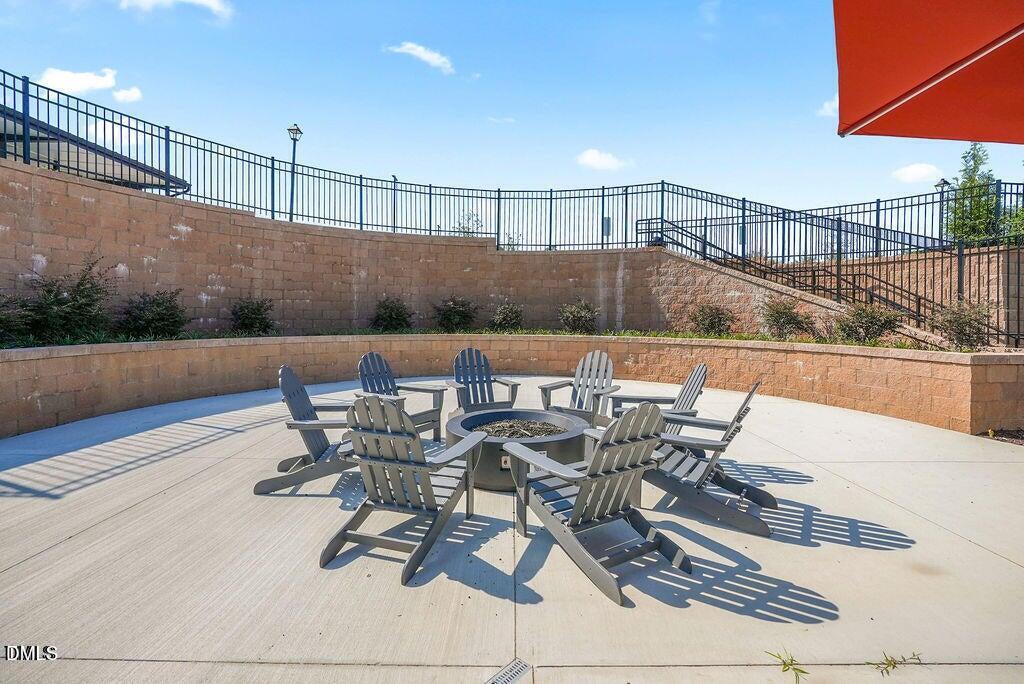 1811 Aspen River Lane Apex, NC 27502 - Photo 42 of 53 a view of a chairs and table on the terrace
