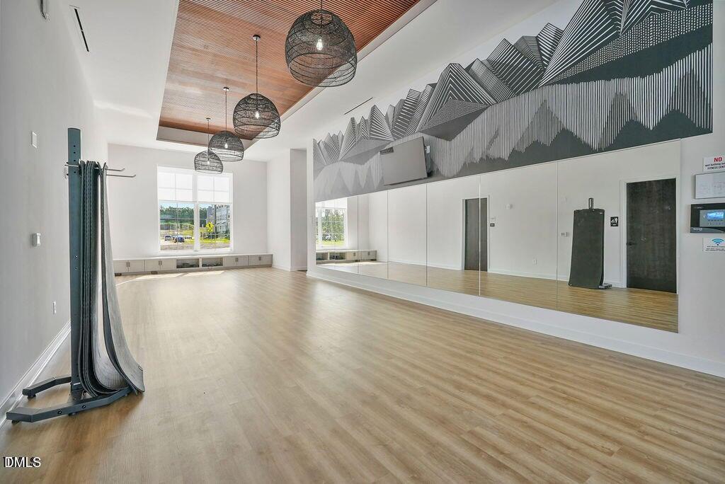 1811 Aspen River Lane Apex, NC 27502 - Photo 43 of 53 a view of an entryway with wooden floor