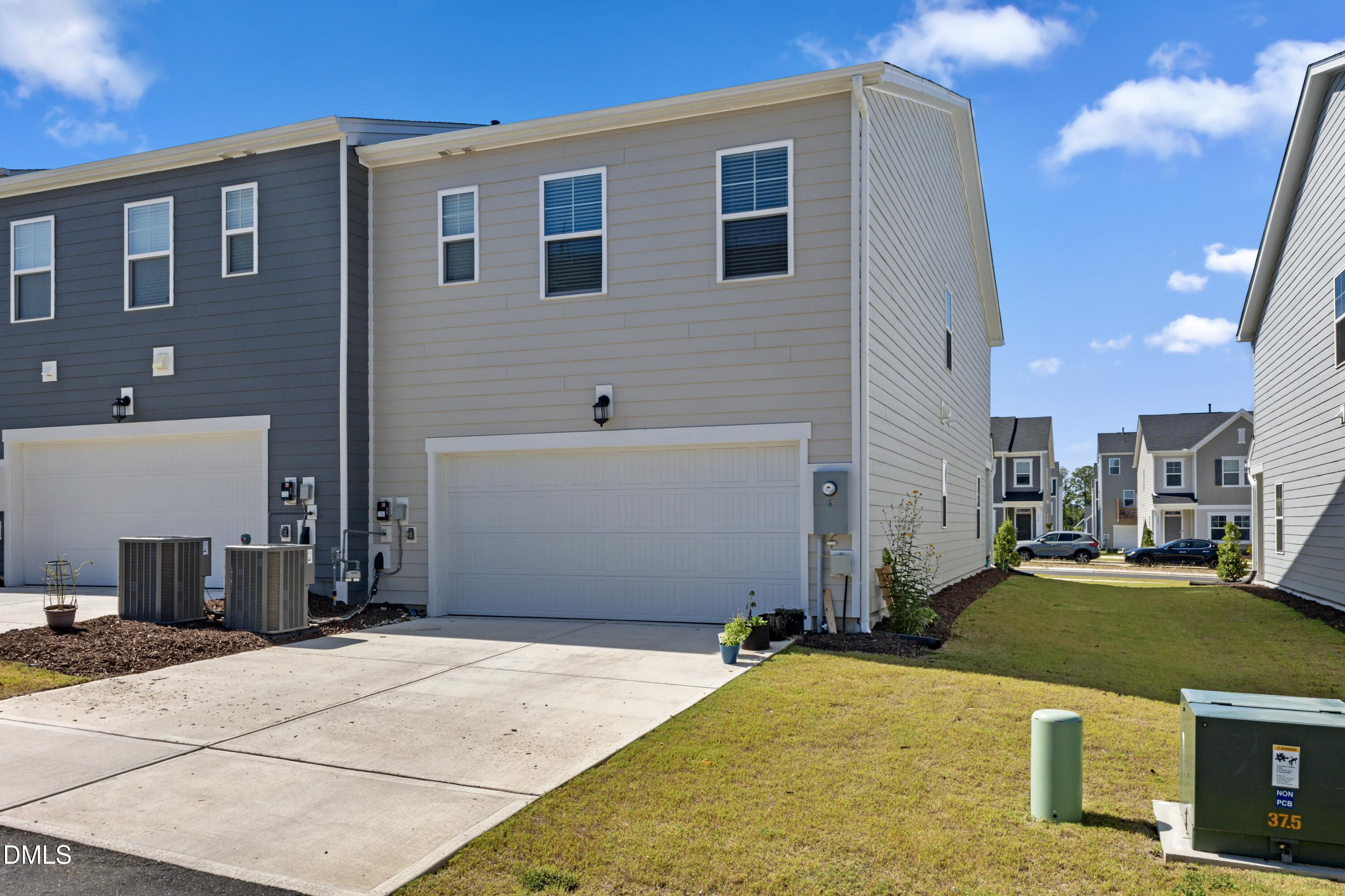 1811 Aspen River Lane Apex, NC 27502 - Photo 6 of 53 a view of a house with a backyard