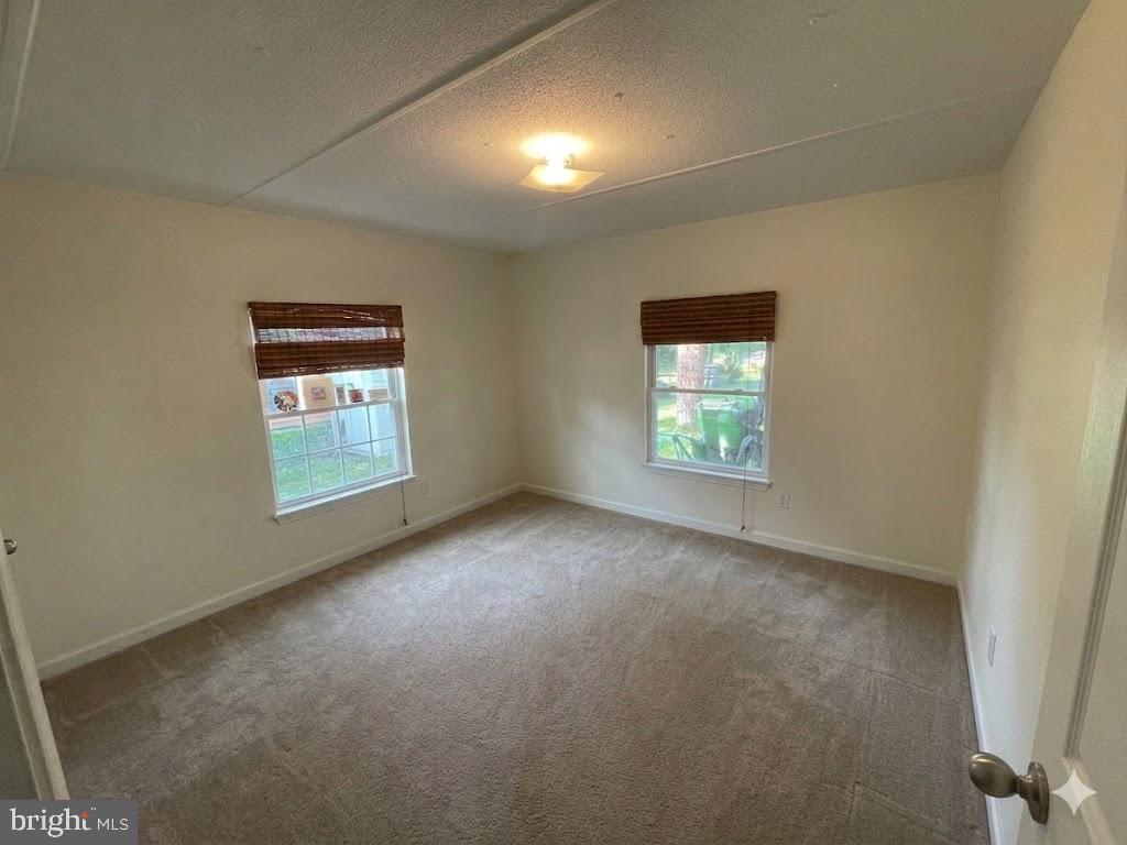 172 Rogers Mill Road Strasburg, VA 22657 - Photo 16 of 23 an empty room with windows