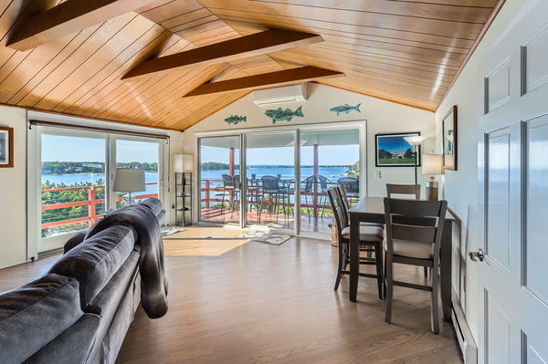 217 Barnes Road Oak Bluffs, MA 02557 - Photo 24 of 60 a dining room with furniture and a large window