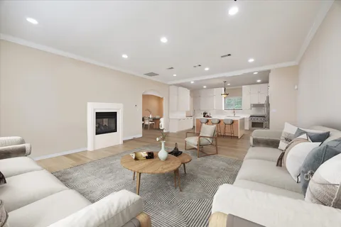 a living room with furniture and a table