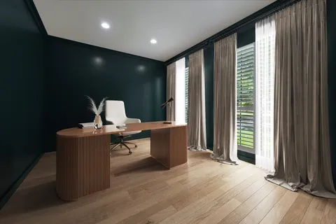 a living room with furniture a large window and wooden floor