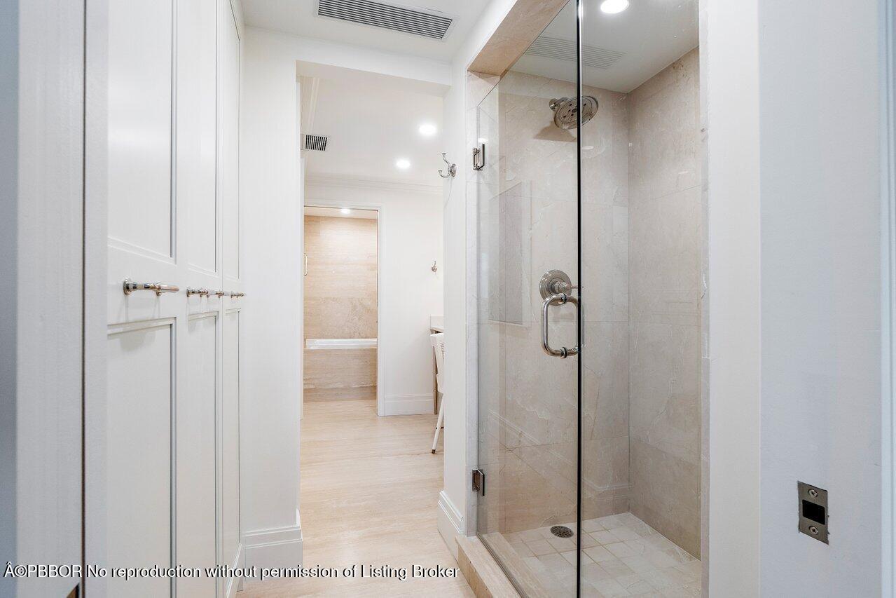 130 Sunrise Avenue, Unit 616 Palm Beach, FL 33480 - Photo 17 of 34 a bathroom with a shower and a glass door