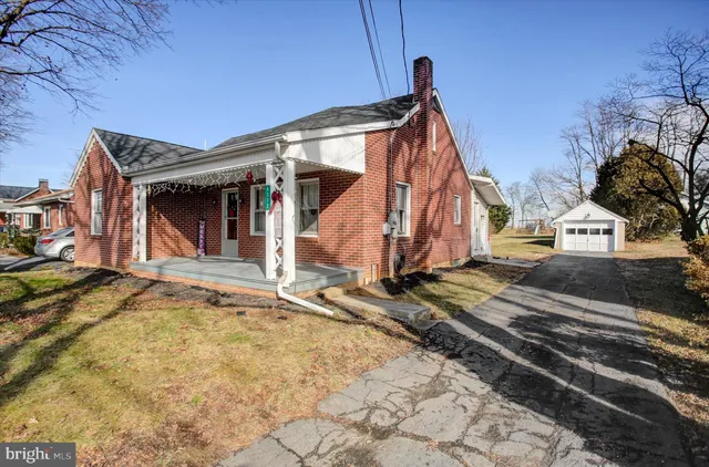 a view of a house with large windows