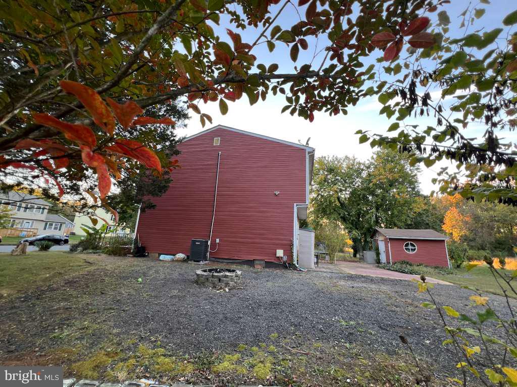 401 Canterbury Road Fredericksburg, VA 22401 - Photo 3 of 8 a front view of a house with a yard