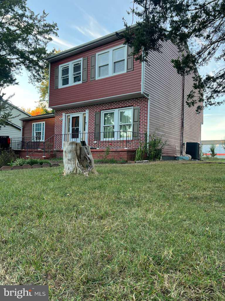 401 Canterbury Road Fredericksburg, VA 22401 - Photo 4 of 8 a front view of house with yard and green space