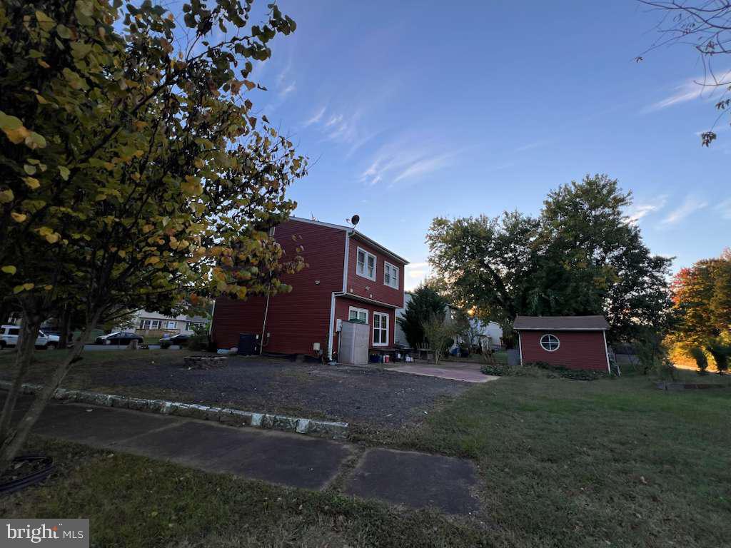 401 Canterbury Road Fredericksburg, VA 22401 - Photo 5 of 8 a view of a house with a yard