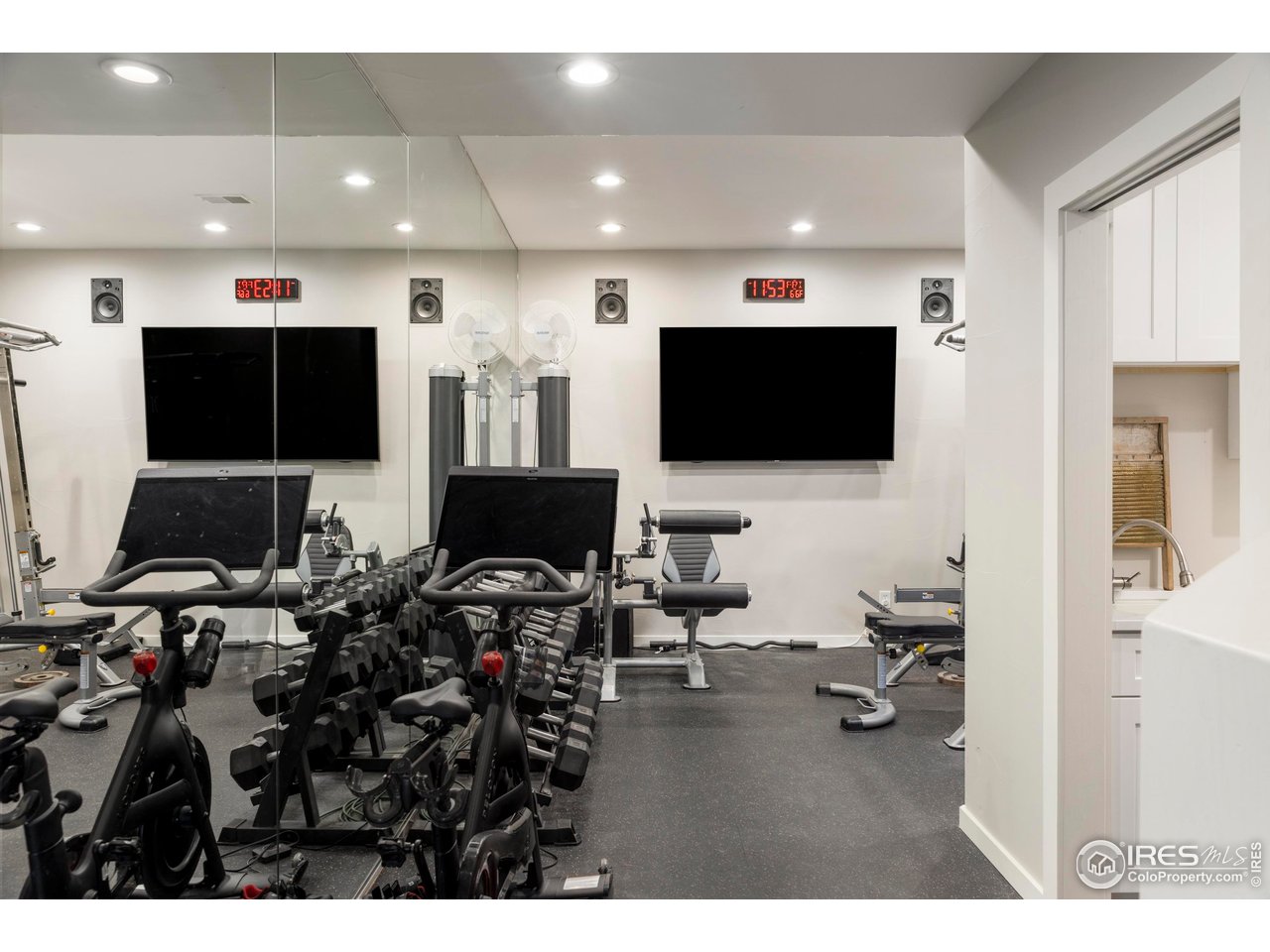 150 Valley View Way Boulder, CO 80304 - Photo 23 of 36 A dedicated gym space with rubber floors and mirrored wall makes daily workouts easy.