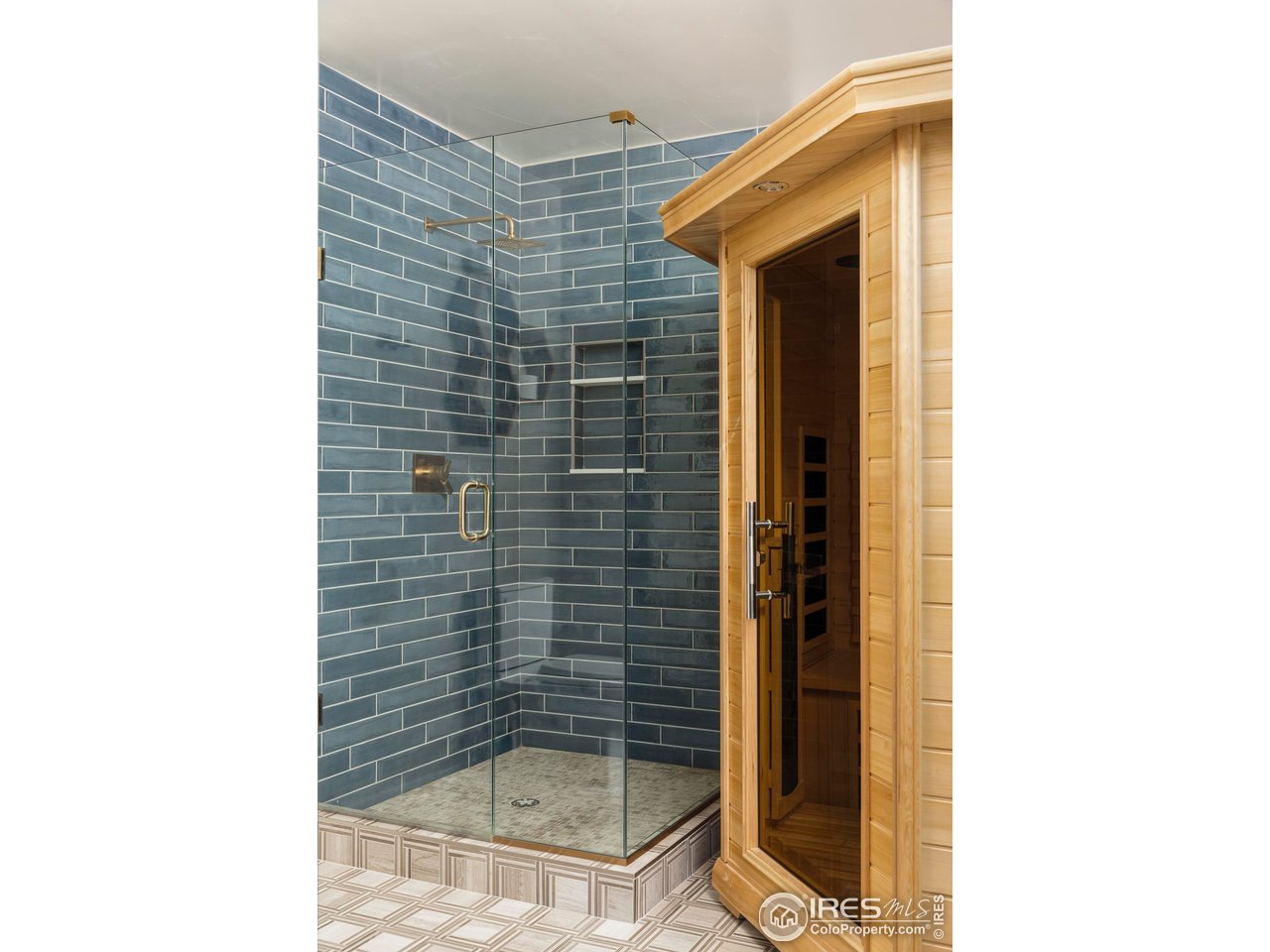 150 Valley View Way Boulder, CO 80304 - Photo 26 of 36 A nearby bathroom with a sauna creates a private wellness retreat, perfect for recovery after a day on the trails or simply unwinding at home.