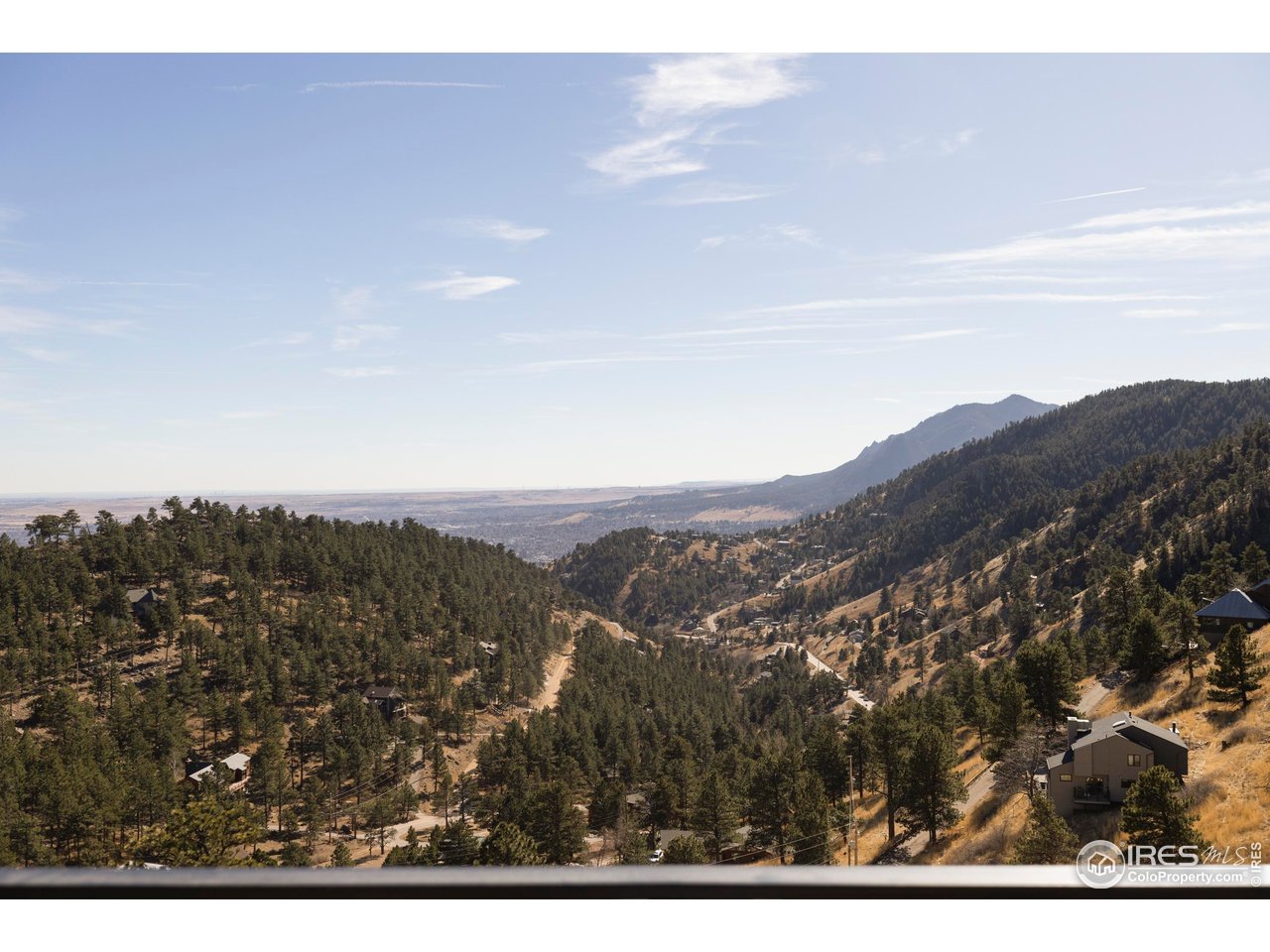 150 Valley View Way Boulder, CO 80304 - Photo 29 of 36 Downtown Boulder sits eight minutes away, North Boulder even closer. Maintained roads, gas lines, excellent water, and rare flat driveway access with ample parking and an attached two-car garage with EV charging make mountain living effortless year-round.