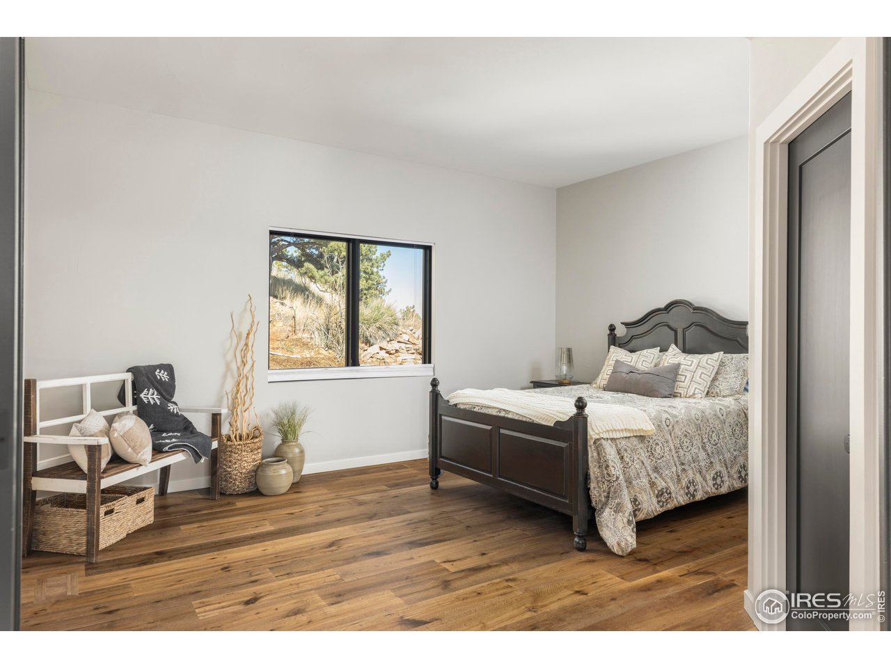 150 Valley View Way Boulder, CO 80304 - Photo 30 of 36 A second main-floor suite provides privacy and flexibility for guests or extended stays.