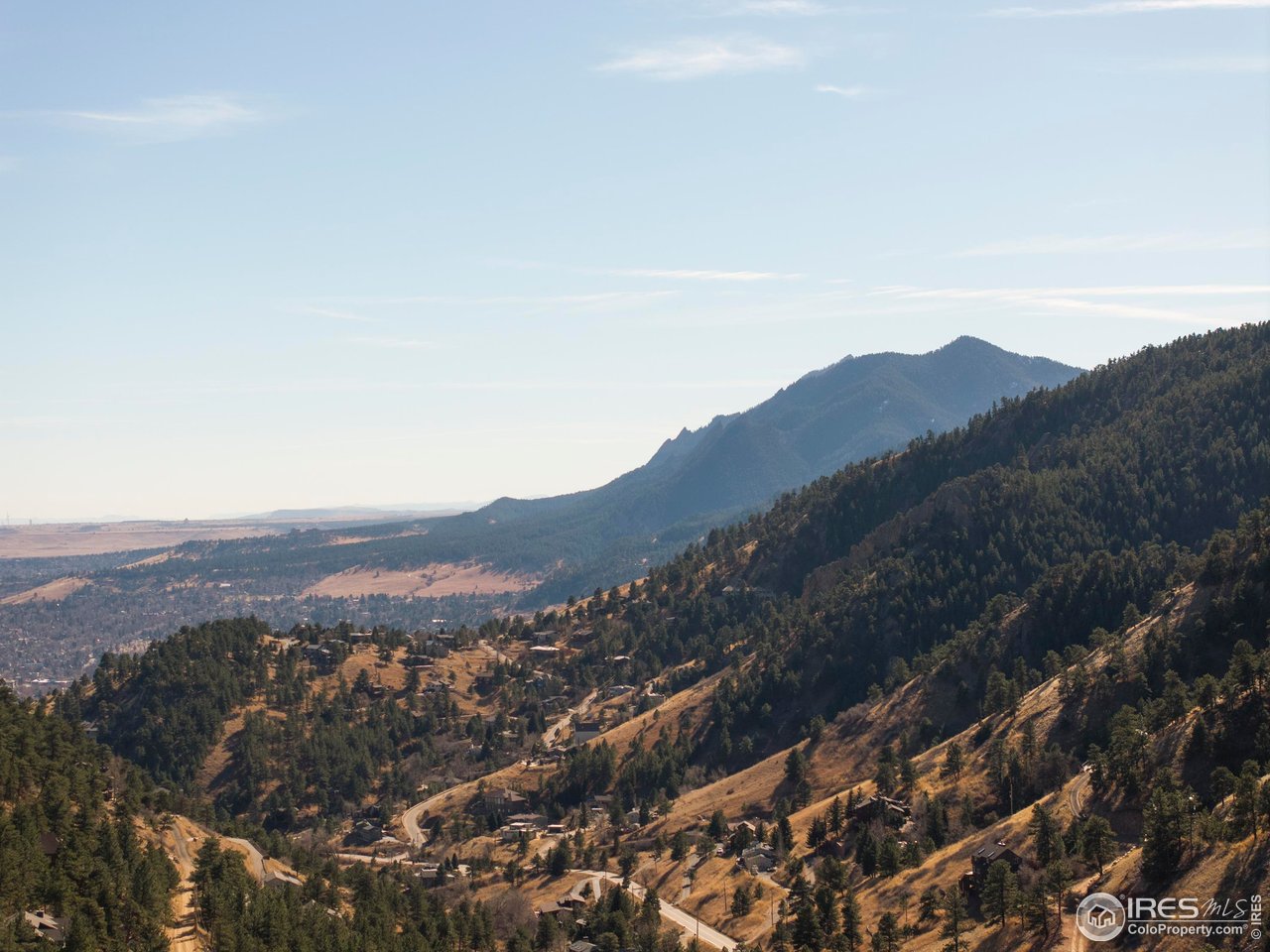 150 Valley View Way Boulder, CO 80304 - Photo 4 of 36 The Flatirons fill the southern view, Boulder spreads across the valley below, and Open Space trails begin steps from your door.