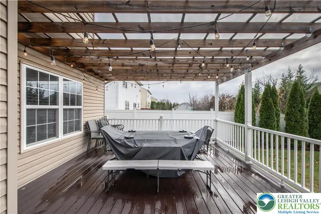a large kitchen with lots of counter space and wooden floor