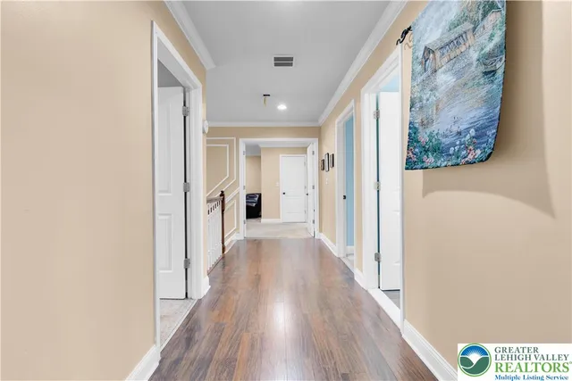 a en suite bathroom with a sink a mirror and a shower