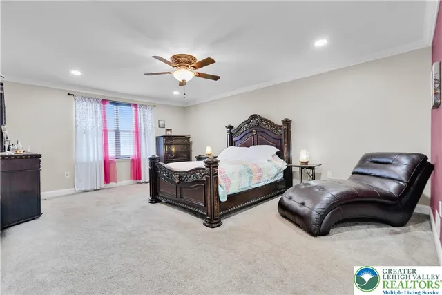 a white toilet sitting next to a bathroom sink