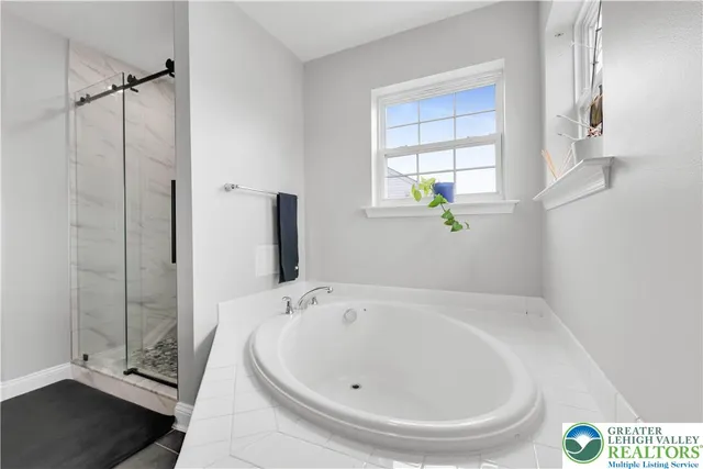 a room with furniture and a flat screen tv