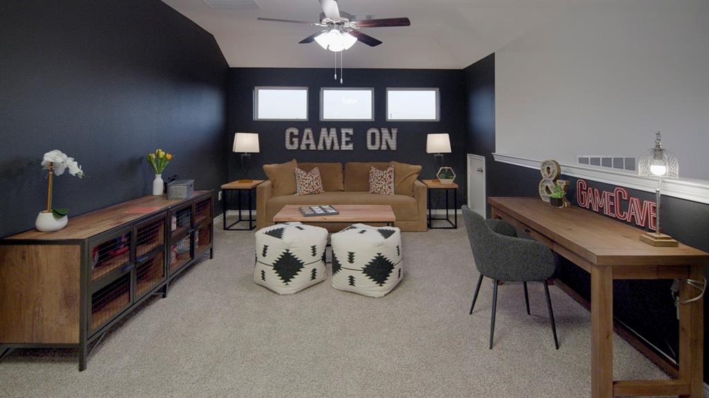 500 Range Road Caddo Mills, TX 75135 - Photo 22 of 35 Expansive bonus room featuring textured carpeting and a ceiling fan