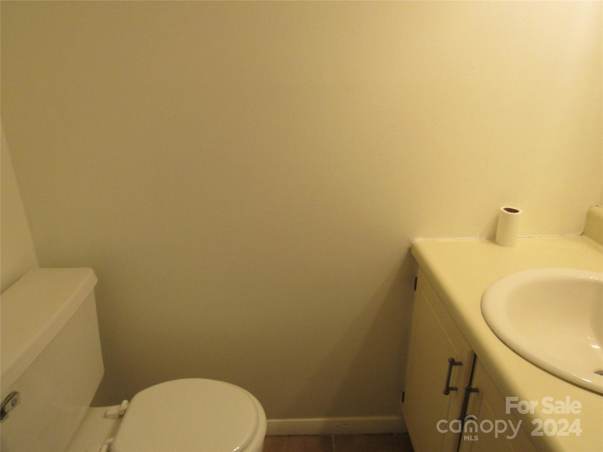 171 Fox Run Road Forest City, NC 28043 - Photo 16 of 32 a bathroom with a sink and a toilet