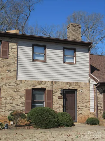 a view of a stone house with a window