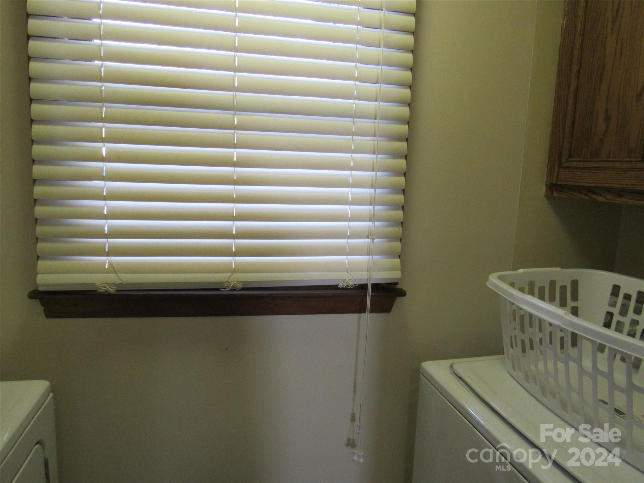 171 Fox Run Road Forest City, NC 28043 - Photo 4 of 32 a bathroom with a bathtub and a window