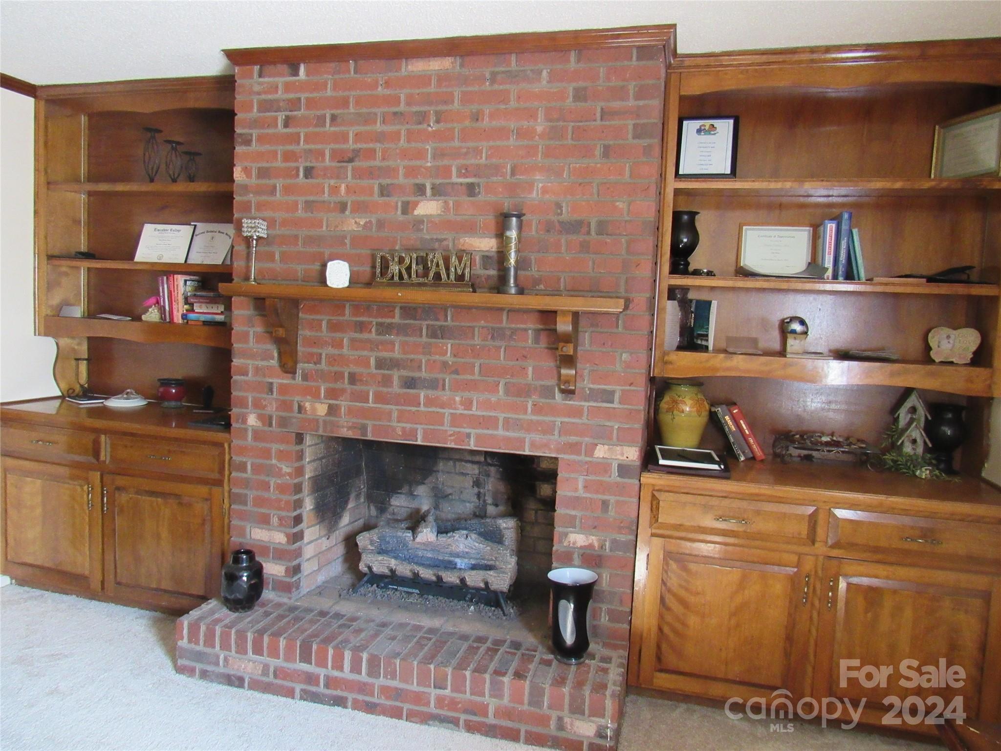 171 Fox Run Road Forest City, NC 28043 - Photo 9 of 32 a living room with a fireplace