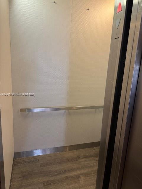 1850 Northeast 169th Street, Unit 308 North Miami Beach, FL 33162 - Photo 13 of 29 a view of an empty walk in closet