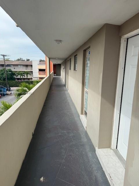 1850 Northeast 169th Street, Unit 308 North Miami Beach, FL 33162 - Photo 16 of 29 a view of a balcony