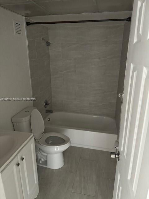 1850 Northeast 169th Street, Unit 308 North Miami Beach, FL 33162 - Photo 24 of 29 a bathroom with a toilet and a shower